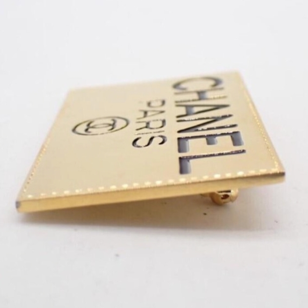 CHANEL Black and Gold Logo Brooch - Picture 5 of 6